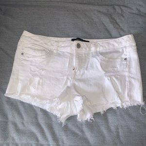 Distressed denim shorts